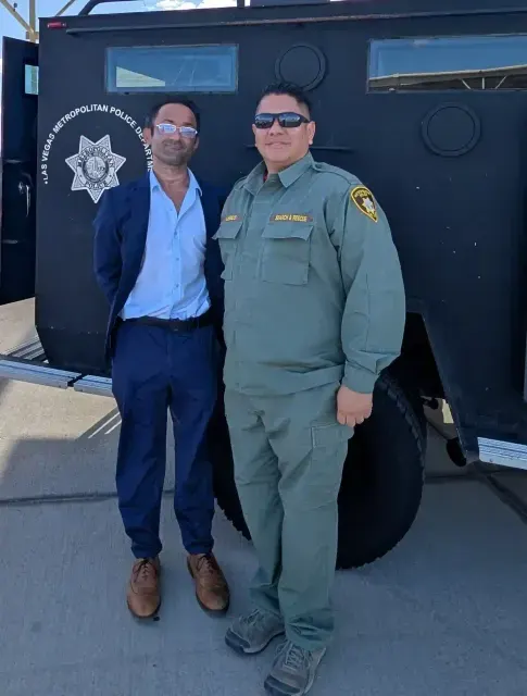 Chris Brandlin with an LVMPD officer