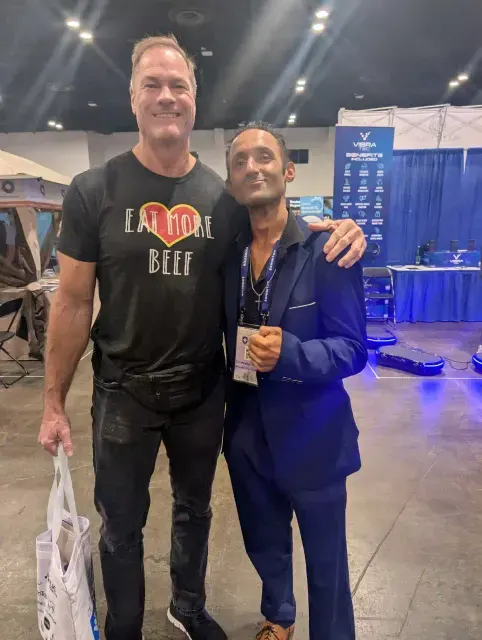 Chris Brandlin with a supporter in an Eat Real Beef shirt